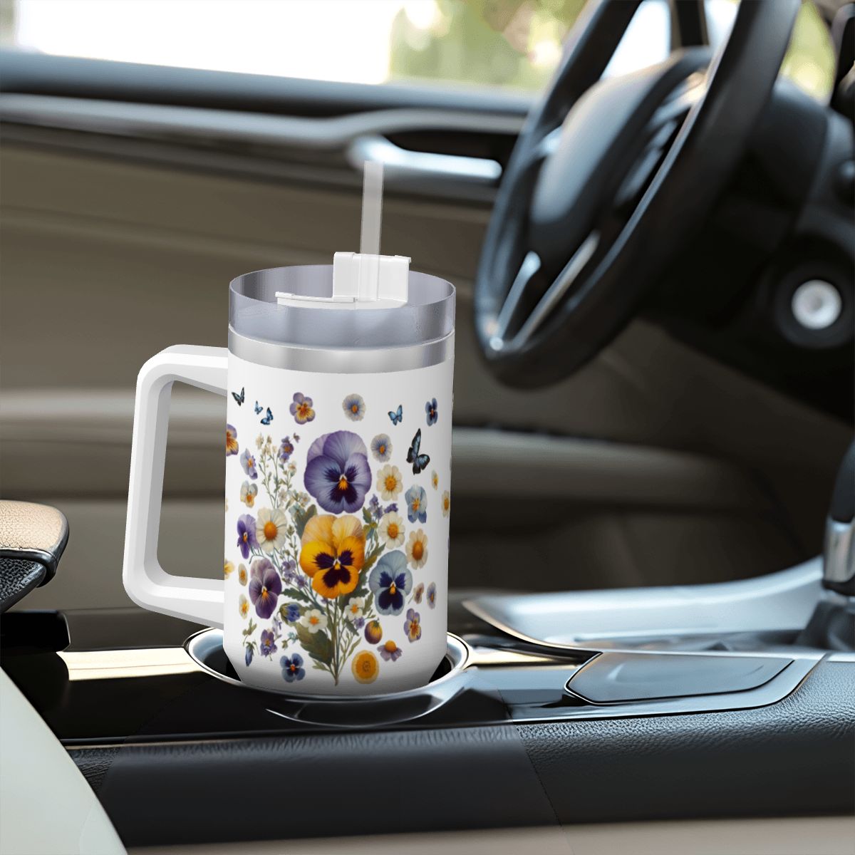40oz stainless steel tumbler featuring real-look pressed pansies, a convenient handle, and a reusable straw.